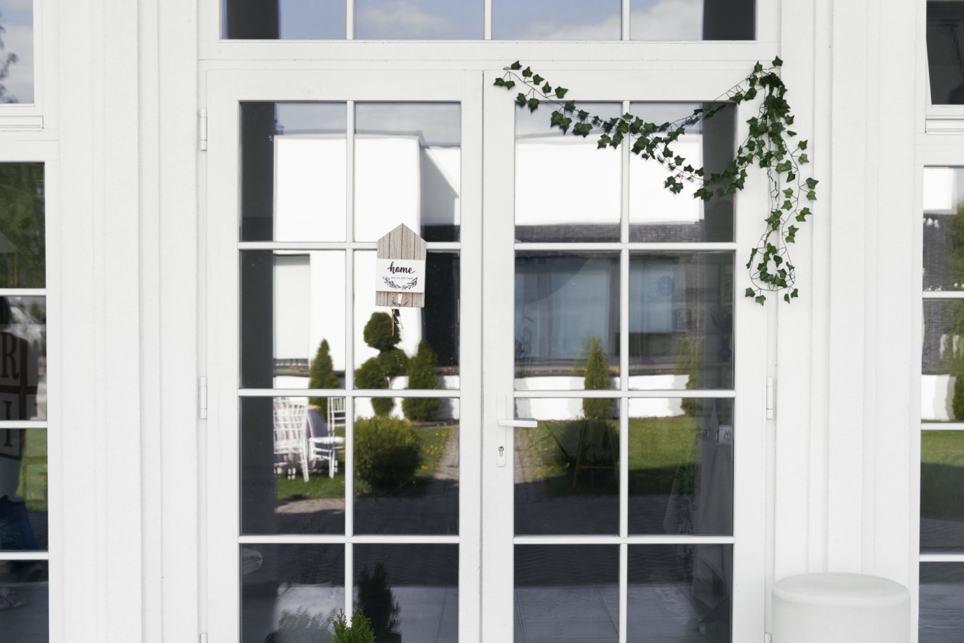 decorated-front-door-with-plant (1)